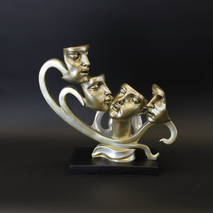 HCHD7769 - Four Charcoal Faces on Base